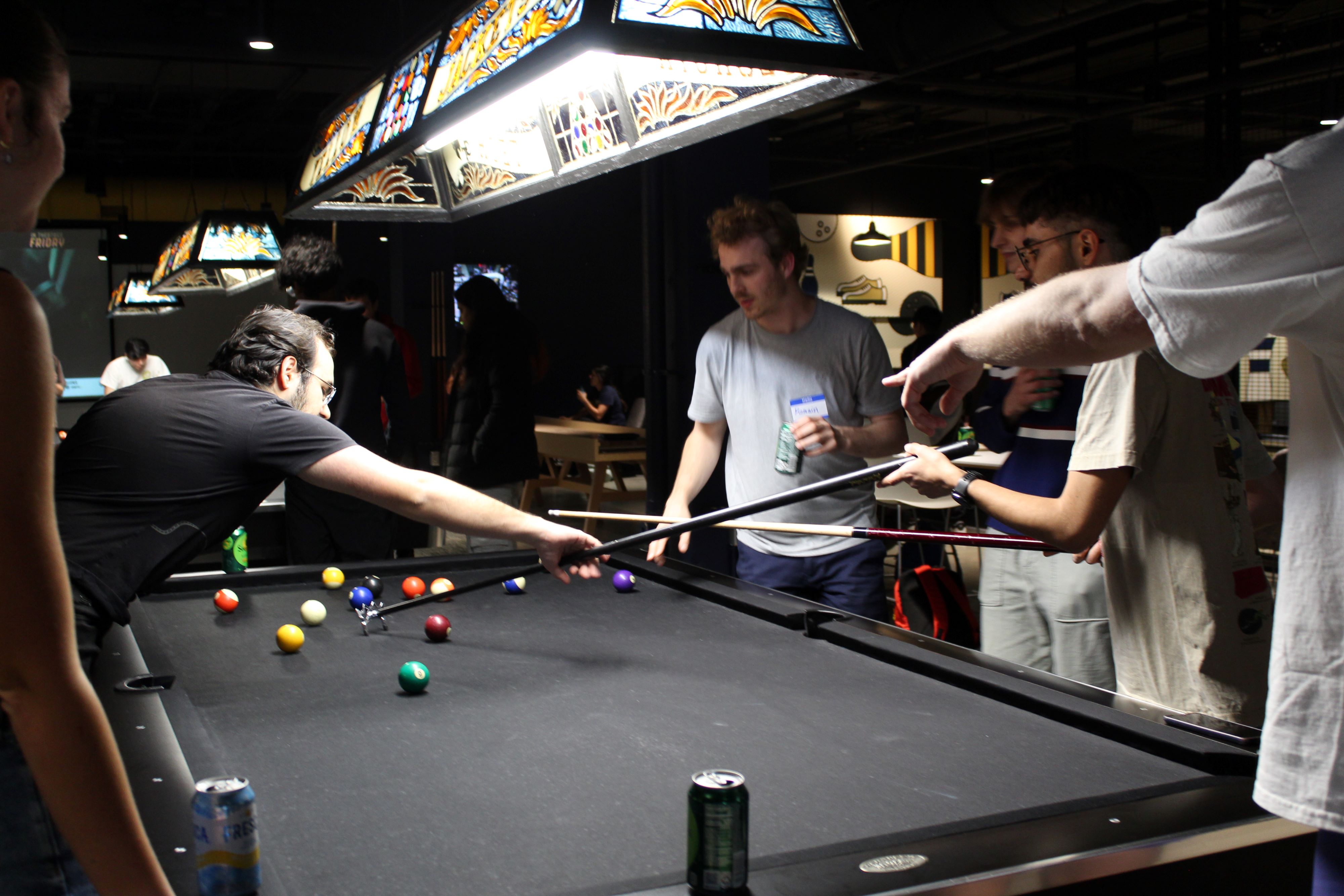 Students playing pool.